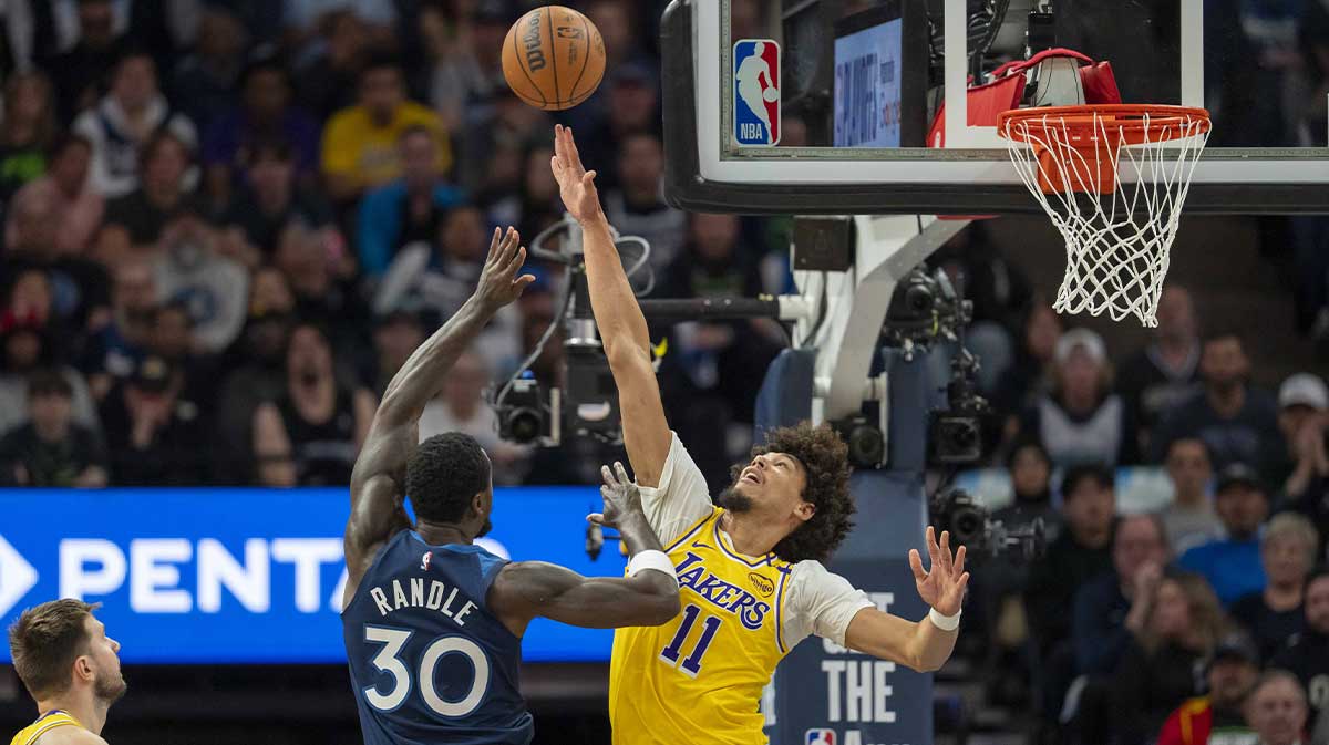 Minnesota Timberwolves forward Julius Randle (30) shoots the ball over Los Angeles Lakers center Jaxson Hayes (11) in the first half during game three of first round for the 2024 NBA Playoffs at Target Center.
