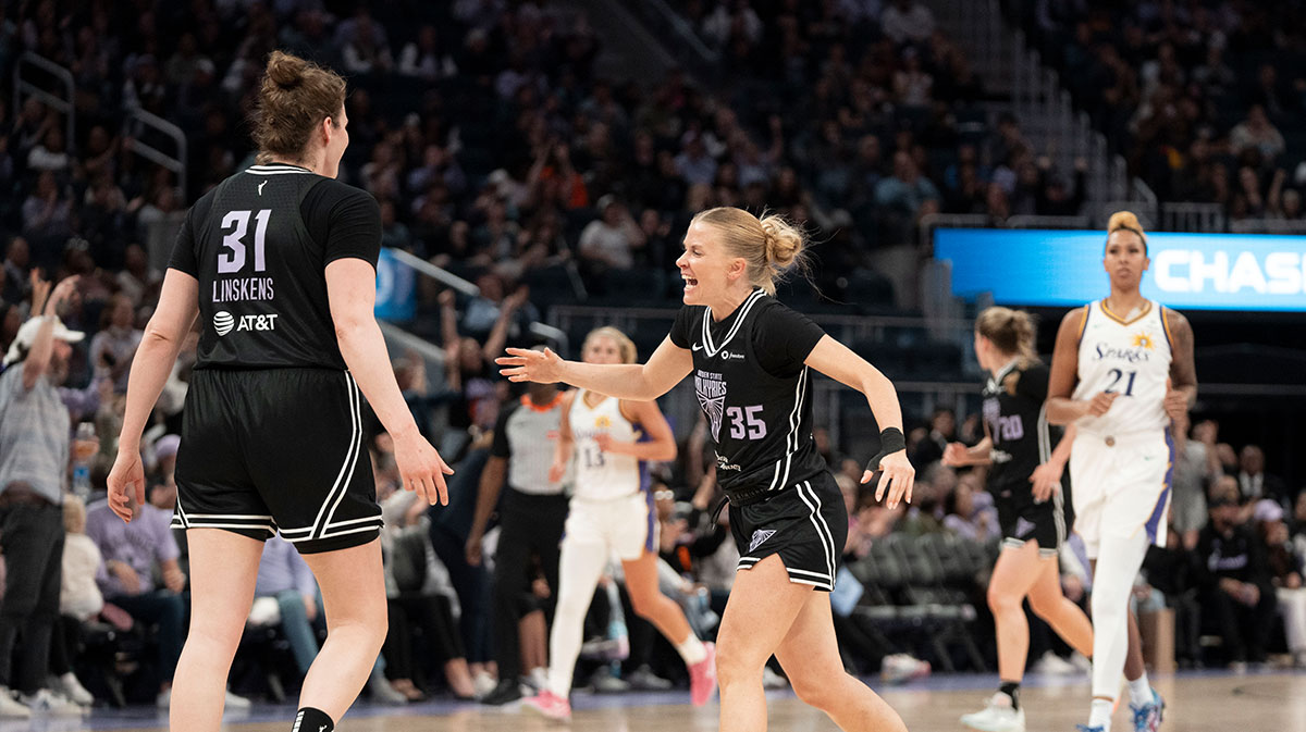 Golden State Valkyries center Kyara Linskens (31) and guard Julie Vanloo (35) celebrate against the Los Angeles Sparks during the third quarter at Chase Center.