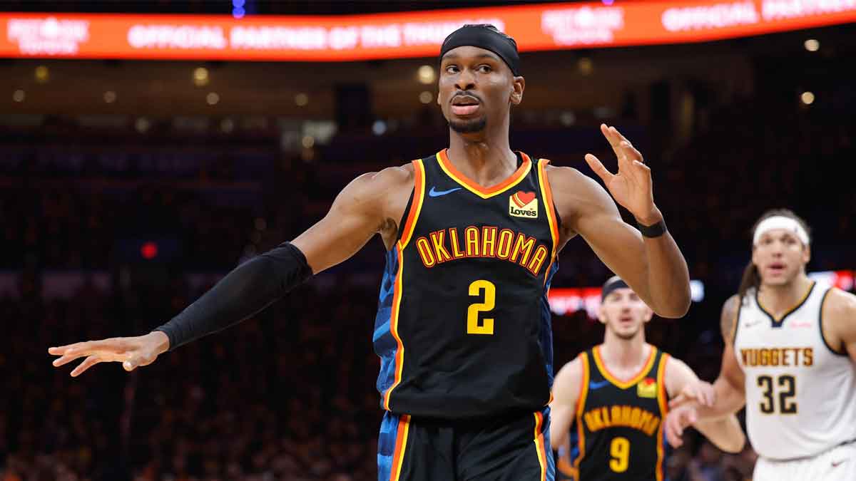 Oklahoma City Thunder guard Shai Gilgeous-Alexander (2) gestures to his team before a play against the Denver Nuggets during the second half during game one of the second round for the 2025 NBA Playoffs at Paycom Center.