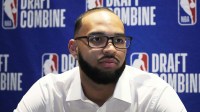 Johni Broome talks to the media during the 2025 NBA Draft Combine at Marriott Marquis Chicago.
