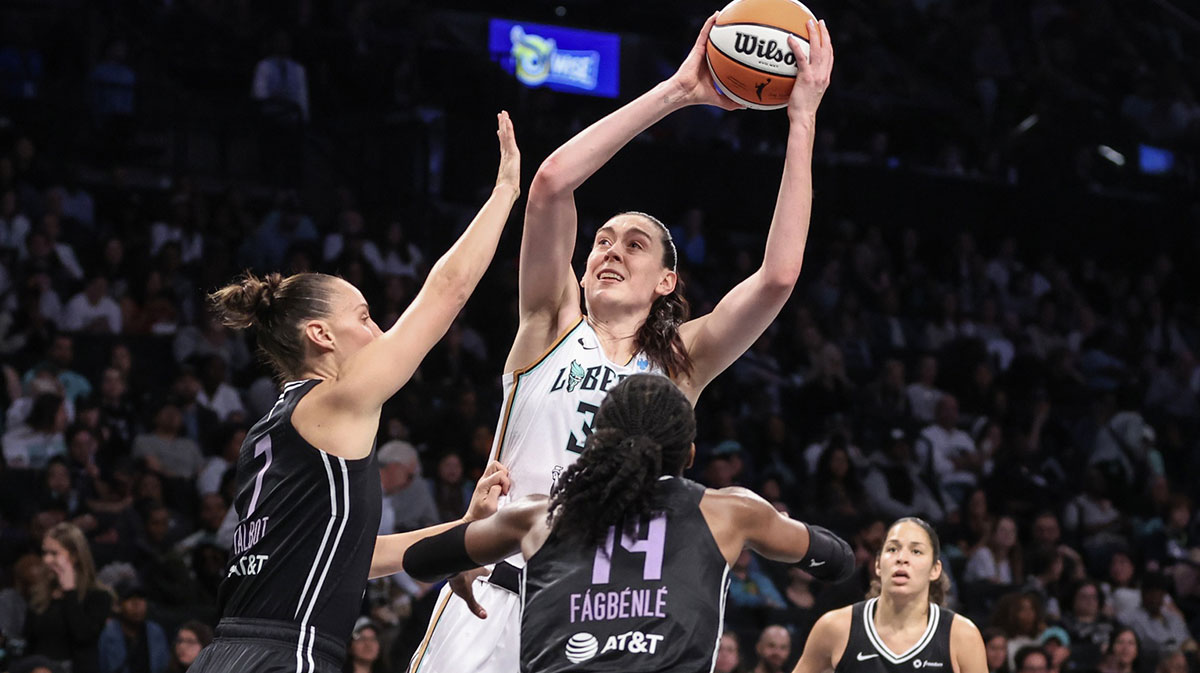 New York Liberty forward Breanna Stewart (30) shoots over Golden State Valkyries forward Stephanie Talbot (7) and center Temi Fagbenle (14) in the third quarter at Barclays Center.
