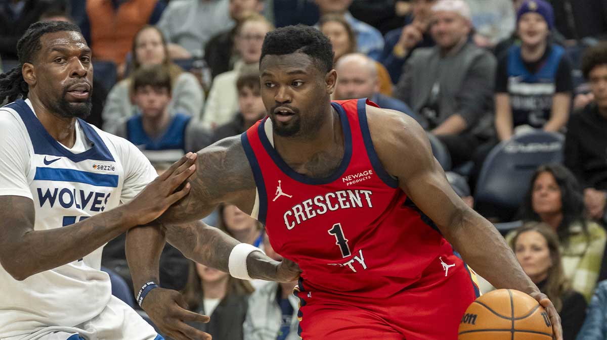 New Orleans Pelicans forward Zion Williamson (1) drives to the basket past Minnesota Timberwolves center Naz Reid (11) in the second half at Target Center.