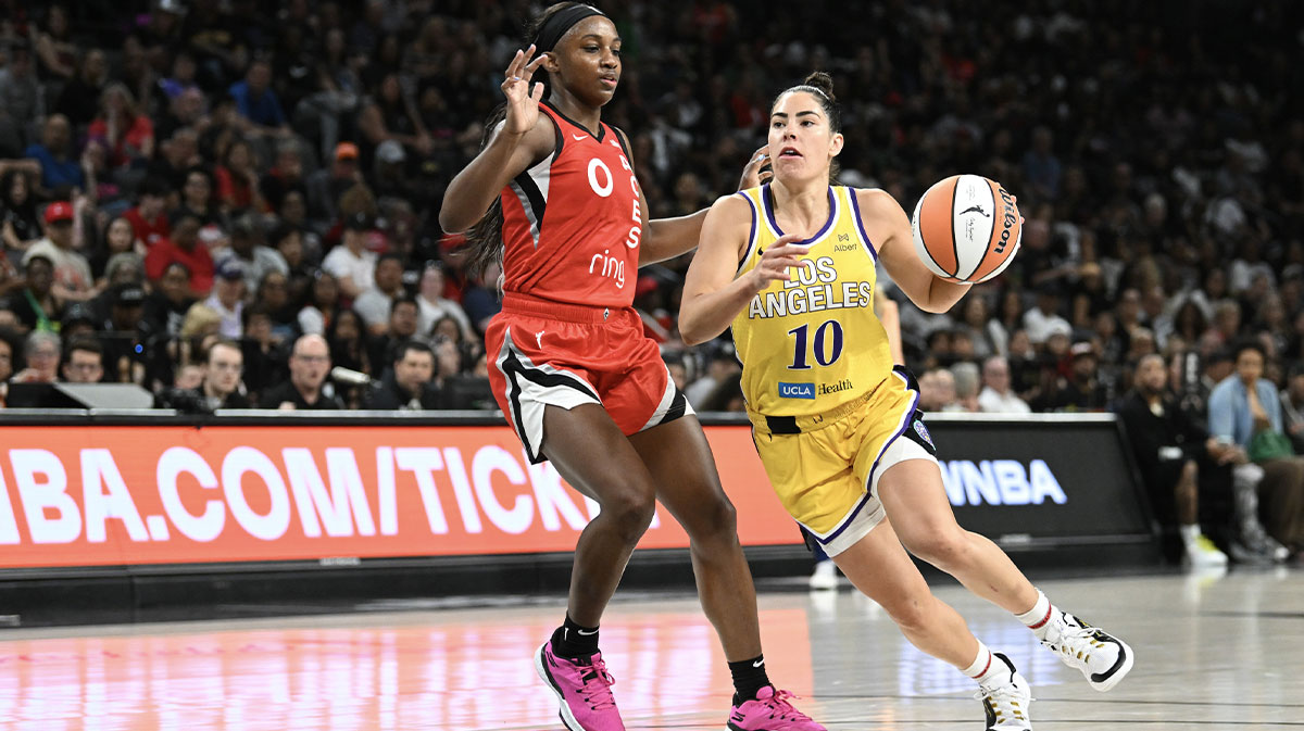 Los Angeles Sparks guard Kelsey Plum (10) drives past Las Vegas Aces guard Jackie Young (0) in the fourth quarter of their game at Michelob Ultra Arena.
