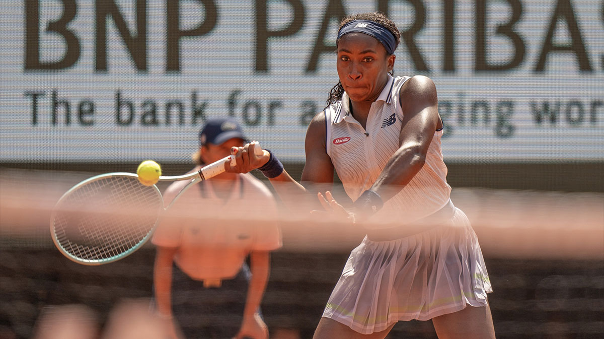 Coco Gauff of the United States returns a shot during her match against Iga Swiatek of Poland on day 12 of Roland Garros at Stade Roland Garros.