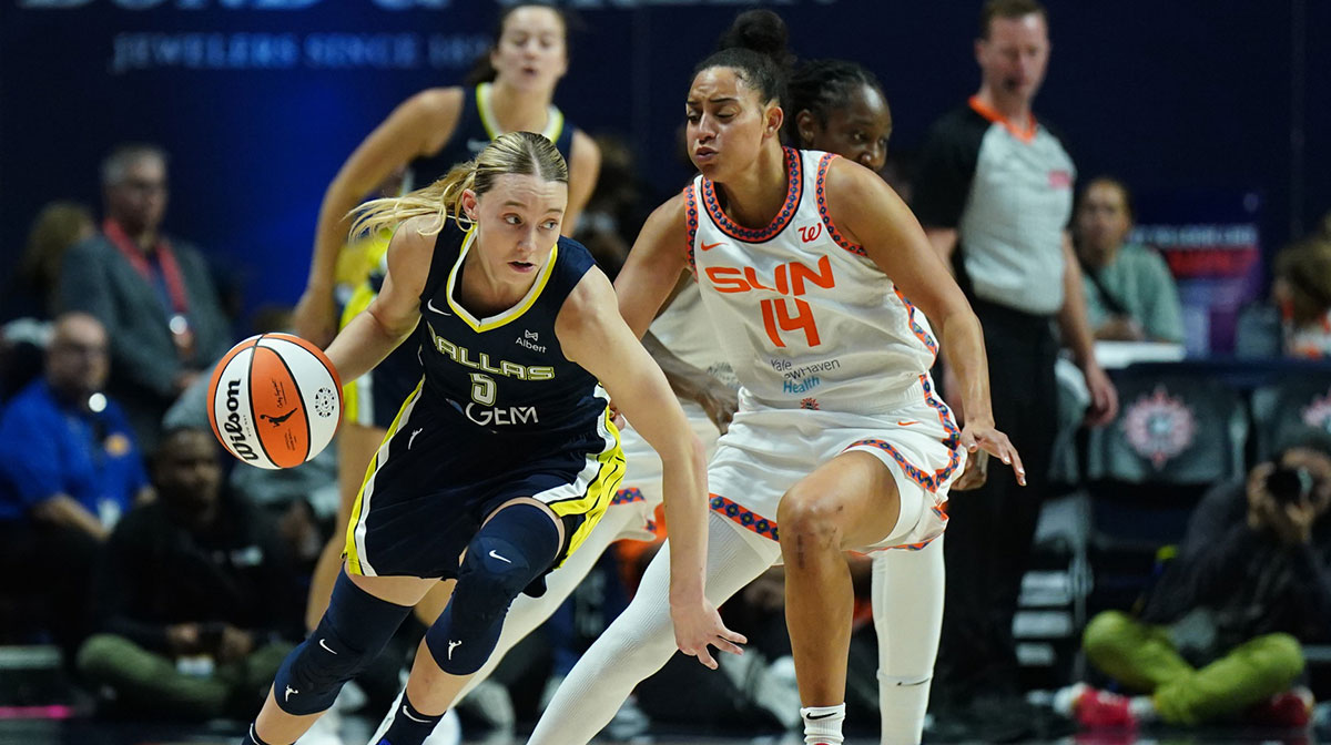 Dallas Wings guard Paige Bueckers drives the ball against Connecticut Sun guard Bria Hartley in the second half at Mohegan Sun Arena.