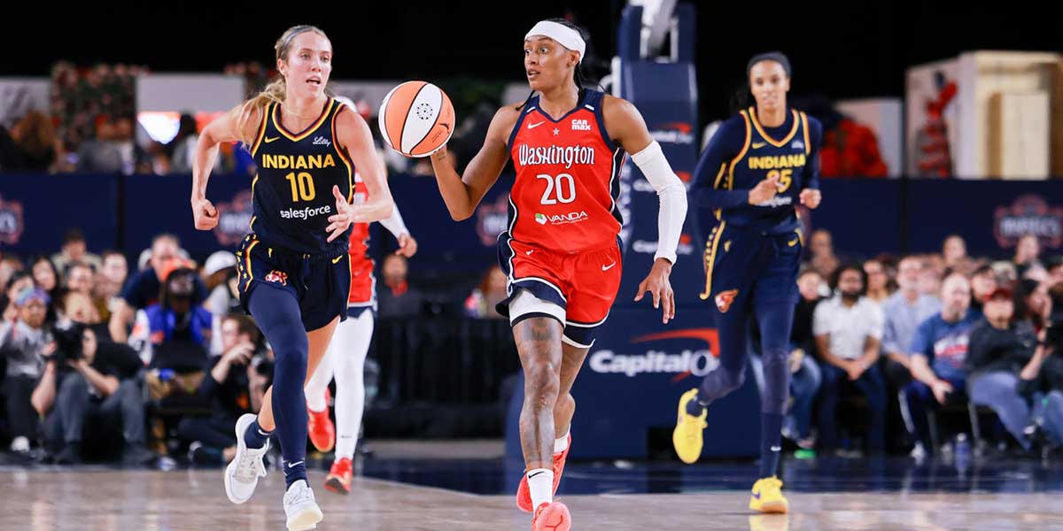 Washington Mystics guard Brittney Sykes (20) dribbles the ball up the court while Indiana Fever guard Lexie Hull (10) and Indiana Fever forward DeWanna Bonner (25) follow at Entertainment & Sports Arena.