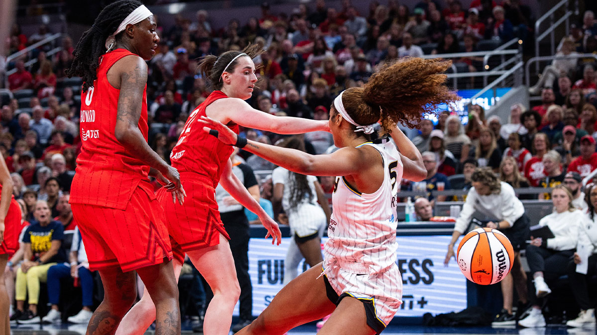 Indiana Fever guard Caitlin Clark (22) fouls Chicago Sky forward Angel Reese (5) in the second half at Gainbridge Fieldhouse.