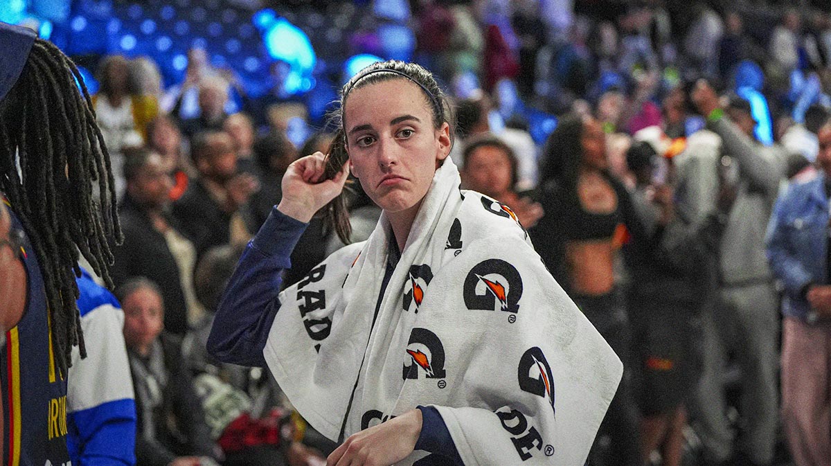 Indiana Fever guard Caitlin Clark (22) leaves the court after the Fever defeated the Atlanta Dream at Gateway Center Arena @ College Park.