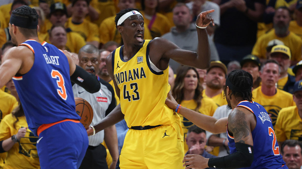 Indiana Pacers forward Pascal Siakam (43) reacts while defended by New York Knicks guard Miles McBride (2) in the third quarter during game six of the eastern conference finals for the 2025 NBA Playoffs at Gainbridge Fieldhouse.