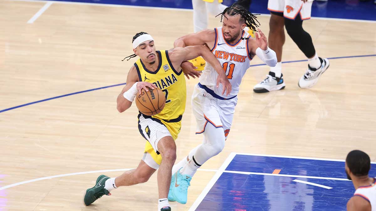 Indiana Pacers guard Andrew Nembhard (2) controls the ball against New York Knicks guard Jalen Brunson (11) in the first quarter during game two of the eastern conference finals for the 2025 NBA Playoffs at Madison Square Garden.