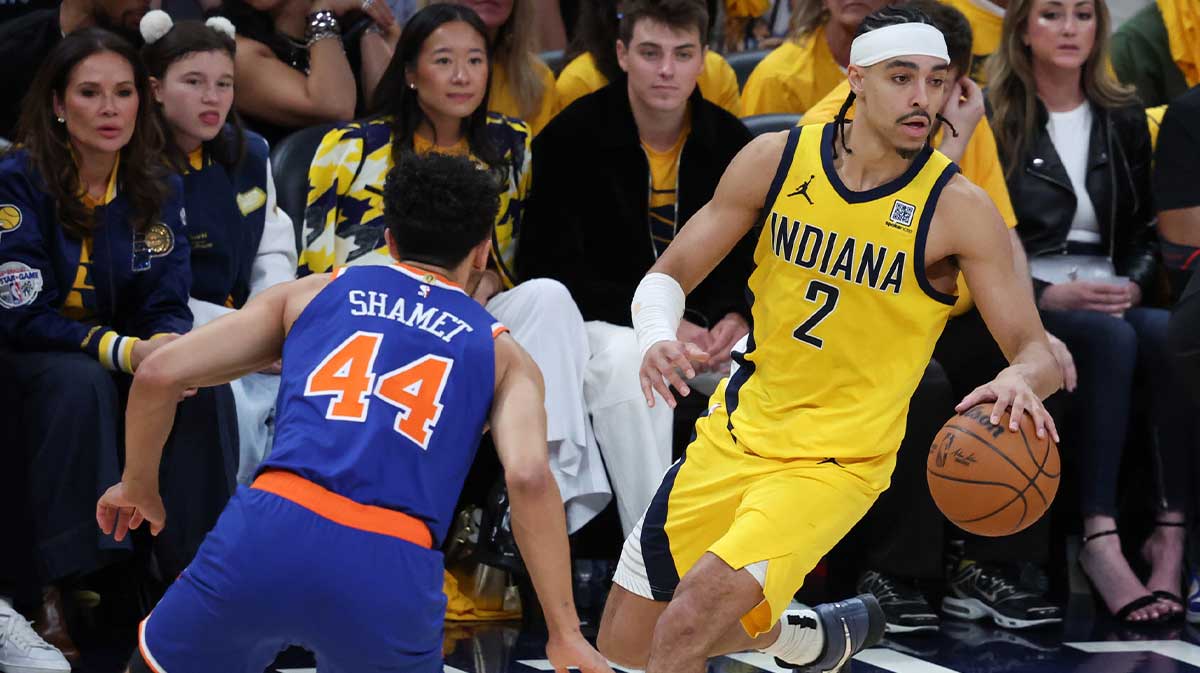 Indiana Pacers guard Andrew Nembhard (2) dribbles the ball against New York Knicks guard Landry Shamet (44) in thex fourth quarter during game six of the eastern conference finals for the 2025 NBA Playoffs at Gainbridge Fieldhouse.