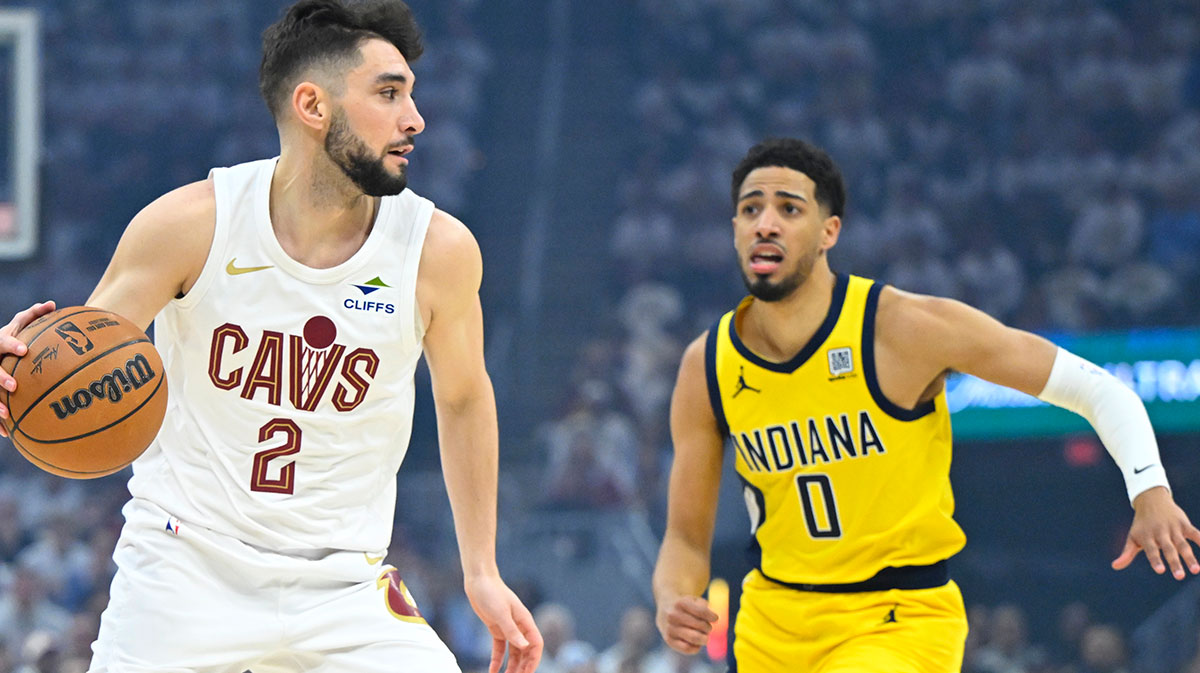 Cleveland Cavaliers guard Ty Jerome (2) dribbles beside Indiana Pacers guard Tyrese Haliburton (0) in the first quarter during game two of the second round of the 2025 NBA Playoffs at Rocket Arena.