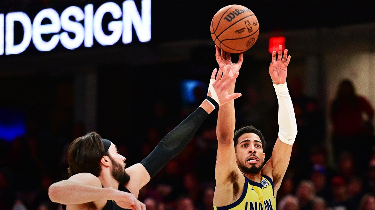 Indiana Pacers guard Tyrese Haliburton (0) shoots over the defense of Cleveland Cavaliers guard Max Strus (1) during the second half of game five of the second round for the 2025 NBA Playoffs at Rocket Arena.