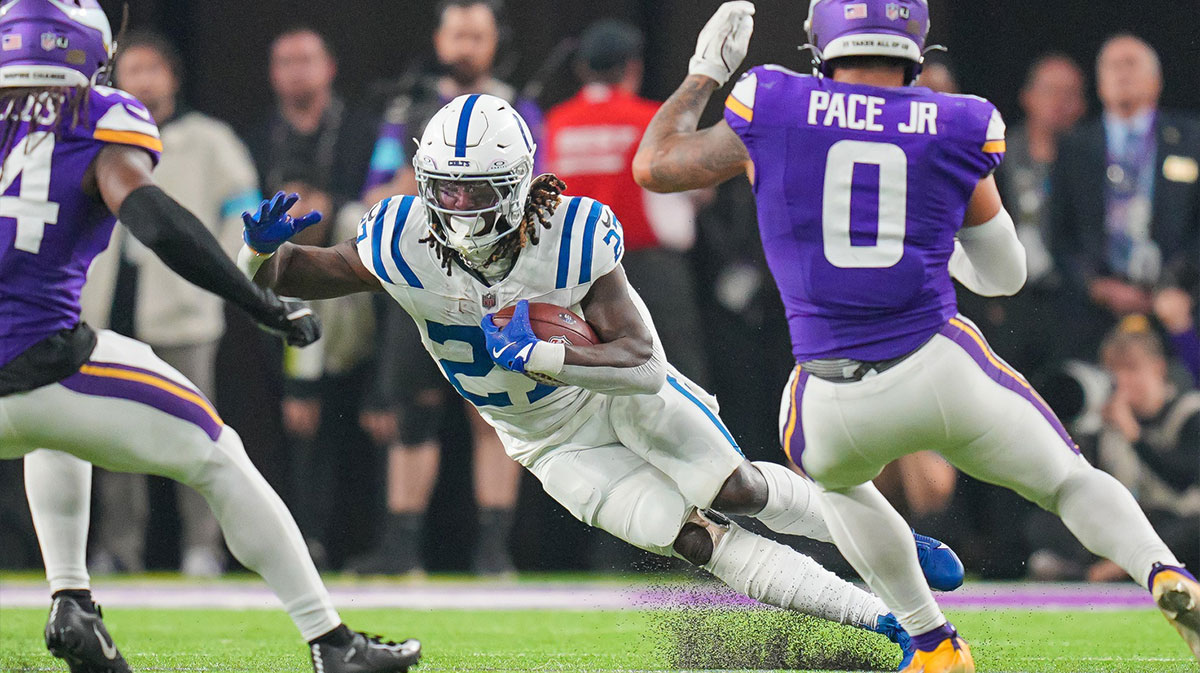Indianapolis Colts running back Trey Sermon (27) runs with the ball against the Minnesota Vikings in the fourth quarter at U.S. Bank Stadium.