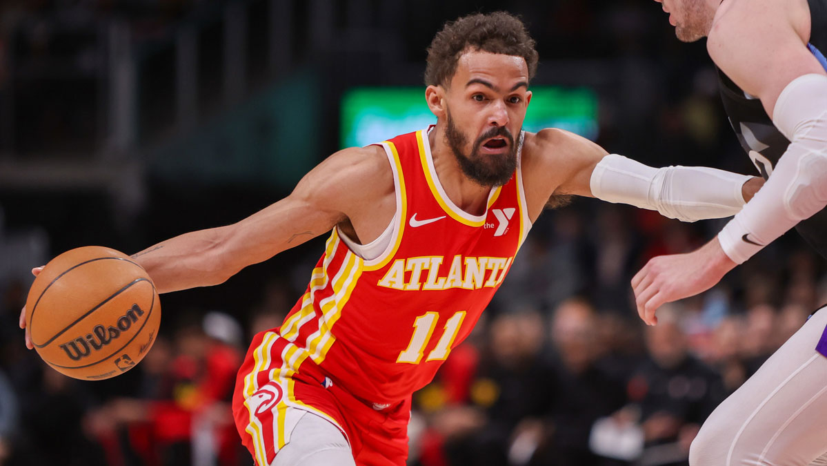 Atlanta Hawks guard Trae Young (11) drives to the basket against the Utah Jazz in the first quarter at State Farm Arena.