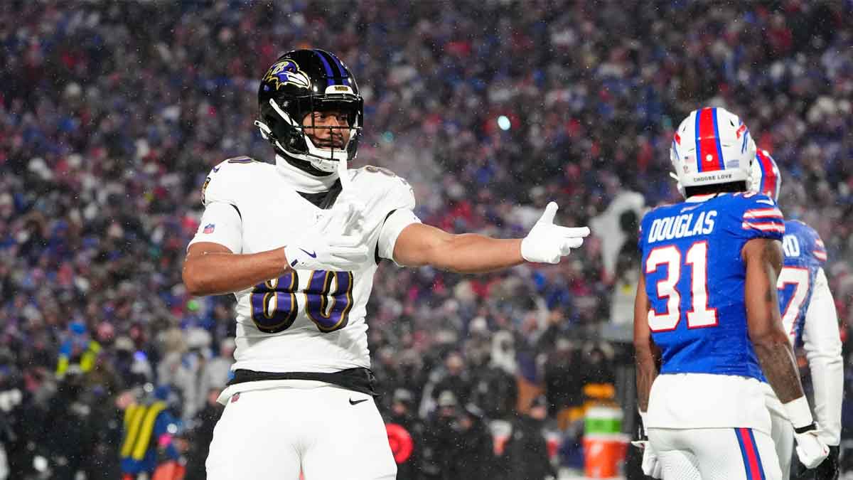Baltimore Ravens tight end Isaiah Likely (80) celebrates after making a catch during the first quarter against the Buffalo Bills in a 2025 AFC divisional round game at Highmark Stadium.