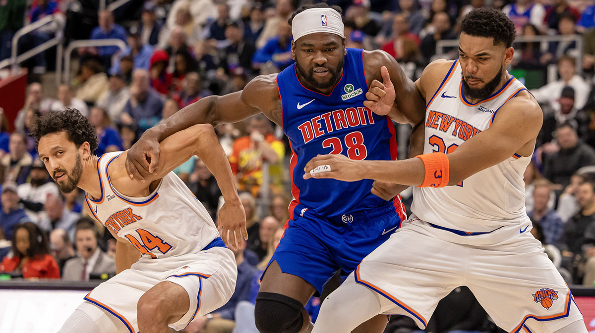 Detroit Pistons center Isaiah Stewart (28) battles for position New York Knicks forward Precious Achiuwa (5) and guard Landry Shamet (44) during the second half at Little Caesars Arena.