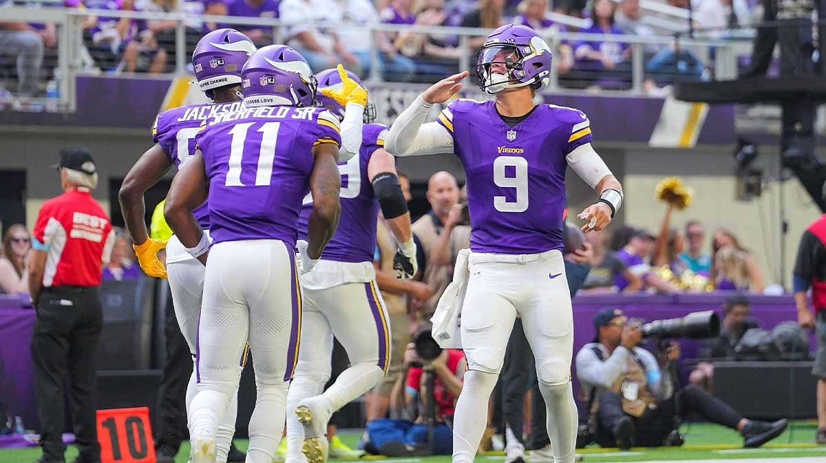Minnesota Vikings quarterback J.J. McCarthy (9) celebrates wide receiver Trent Sherfield Sr. (11) touchdown against the Las Vegas Raiders in the third quarter.