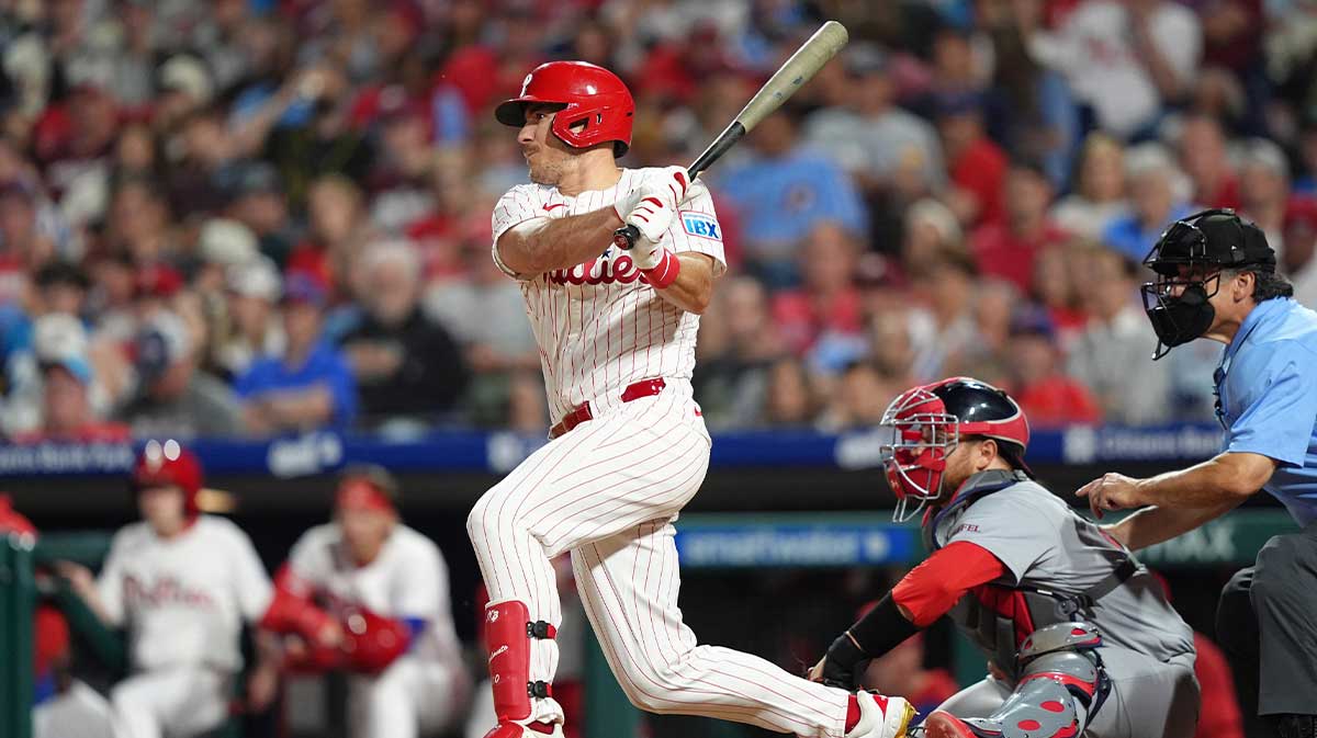 Philadelphia Phillies catcher J.T. Realmuto (10) hits a single against the St. Louis Cardinals in the eighth inning at Citizens Bank Park.