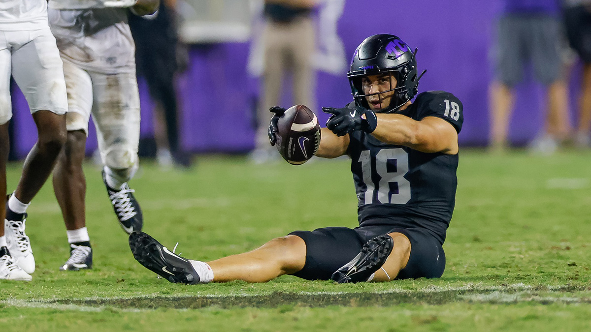 TCU Horned Frogs wide receiver Jack Bech (18) signals first down after a catch during the fourth quarter against the UCF Knights at Amon G. Carter Stadium.