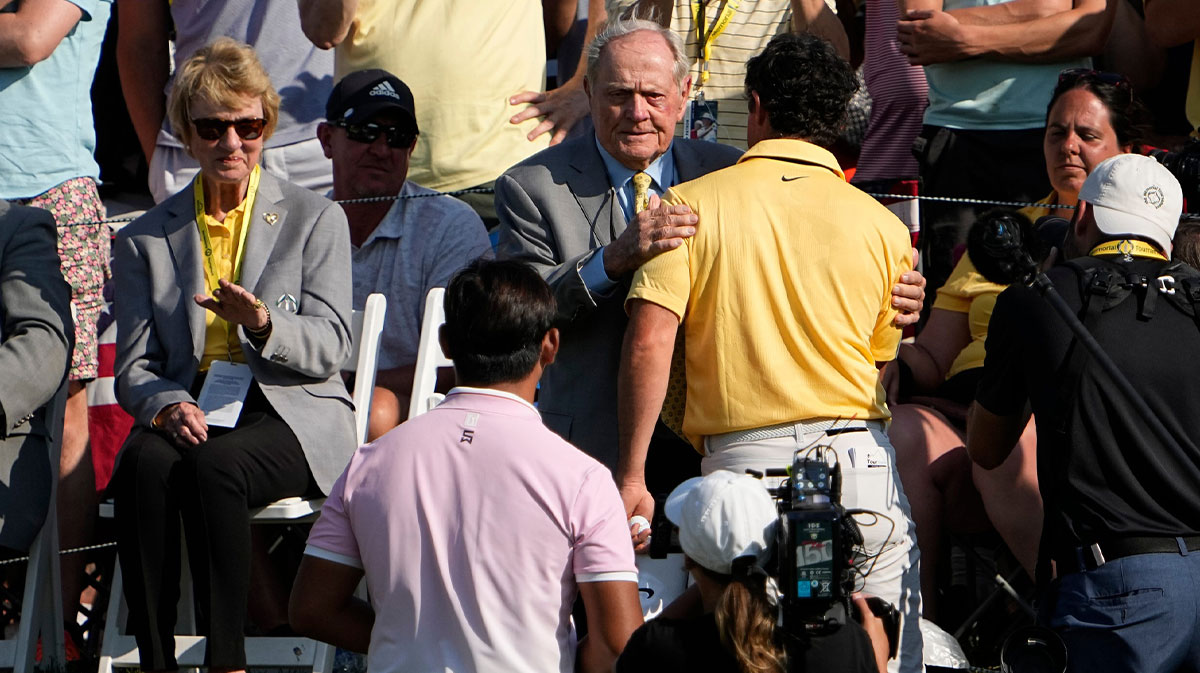 Dublin, Ohio, USA; Jack Nicklaus hugs Rory McIlroy following the final round of the Memorial Tournament at Muirfield Village Golf Club.