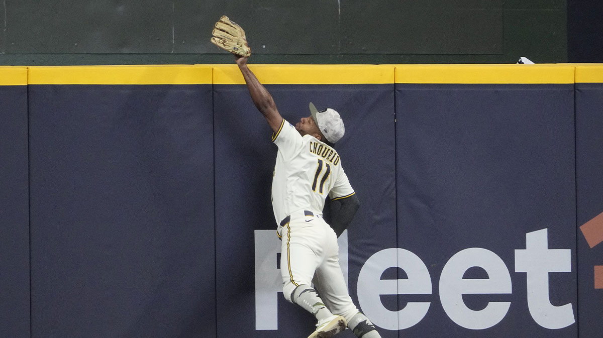 Milwaukee Brewers outfielder Jackson Chourio (11) keeps a home run from going over the wall against the Minnesota Twins in the eighth inning at American Family Field.