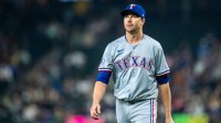 Sep 13, 2024; Seattle, Washington, USA; Texas Rangers starting pitcher Jacob deGrom (48) walks off the field during a game against the Seattle Mariners at T-Mobile Park. Mandatory Credit: Stephen Brashear-Imagn Images