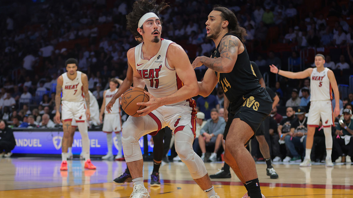 Miami Heat guard Jaime Jaquez Jr. (11) drives to the basket against Cleveland Cavaliers forward Jaylon Tyson (24) in the fourth quarter during game four for the first round of the 2025 NBA Playoffs at Kaseya Center.