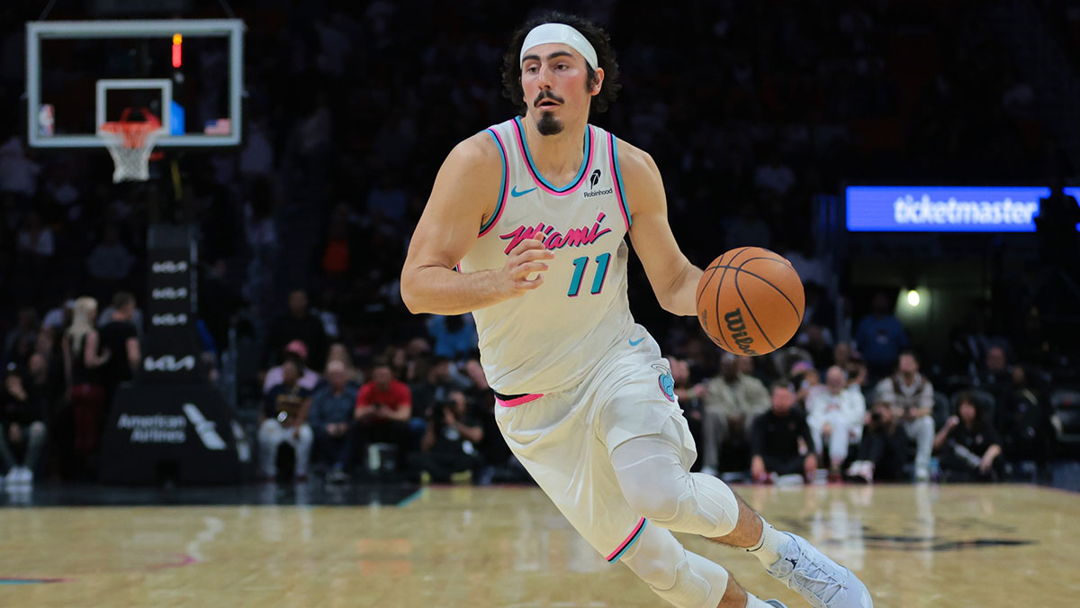 Miami Heat guard Jaime Jaquez Jr. (11) drives to the basket against the Denver Nuggets during the fourth quarter at Kaseya Center.