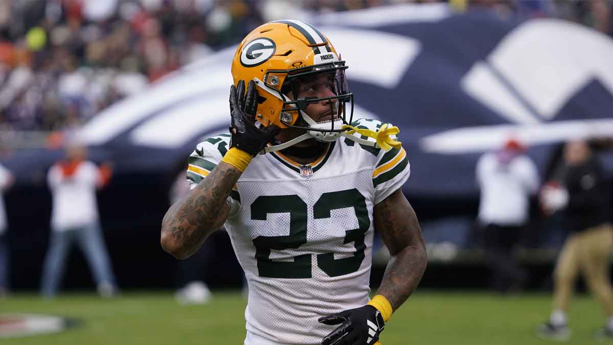 Green Bay Packers cornerback Jaire Alexander (23) gestures to the fans before the game against the Chicago Bears at Soldier Field.