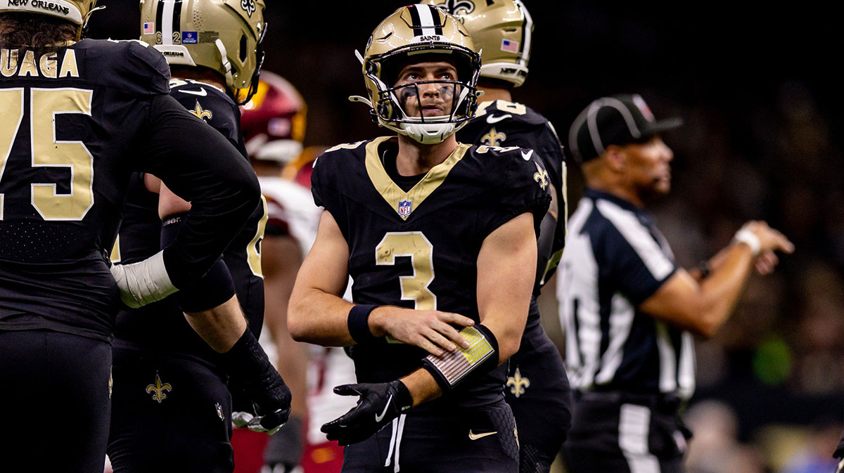 New Orleans Saints quarterback Jake Haener (3) looks on against the Washington Commanders during the first half at Caesars Superdome.