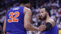 New York Knicks guard Jalen Brunson (11) talks to center Karl-Anthony Towns (32) in the second half against the Detroit Pistons during game six of first round for the 2024 NBA Playoffs at Little Caesars Arena.