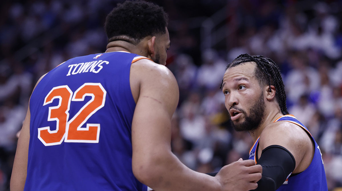 New York Knicks guard Jalen Brunson (11) talks to center Karl-Anthony Towns (32) in the second half against the Detroit Pistons during game six of first round for the 2024 NBA Playoffs at Little Caesars Arena.