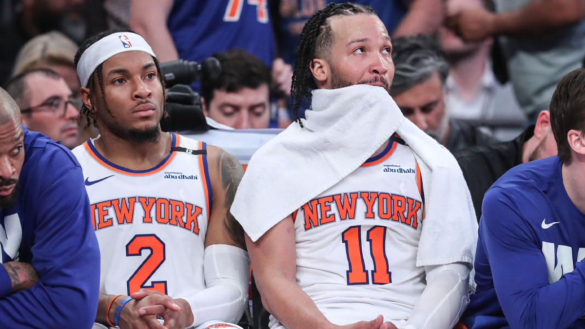 New York Knicks guards Miles McBride (2) and Jalen Brunson (11) sit on the bench in the closing minute of the fourth quarter against the Boston Celtics during game three of the second round for the 2025 NBA Playoffs at Madison Square Garden.