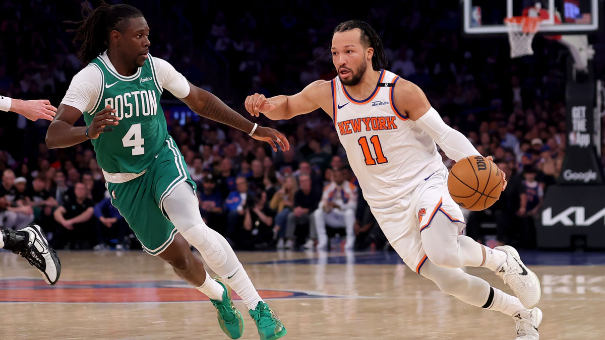 New York Knicks guard Jalen Brunson (11) drives to the basket against Boston Celtics guard Jrue Holiday (4) during the second quarter of game six in the second round of the 2025 NBA Playoffs at Madison Square Garden.
