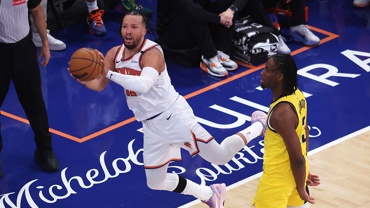 New York Knicks guard Jalen Brunson (11) controls the ball against Indiana Pacers forward Aaron Nesmith (23) in the third quarter during game one of the eastern conference finals for the 2025 NBA Playoffs at Madison Square Garden. Mandatory Credit: Brad Penner-Imagn Images