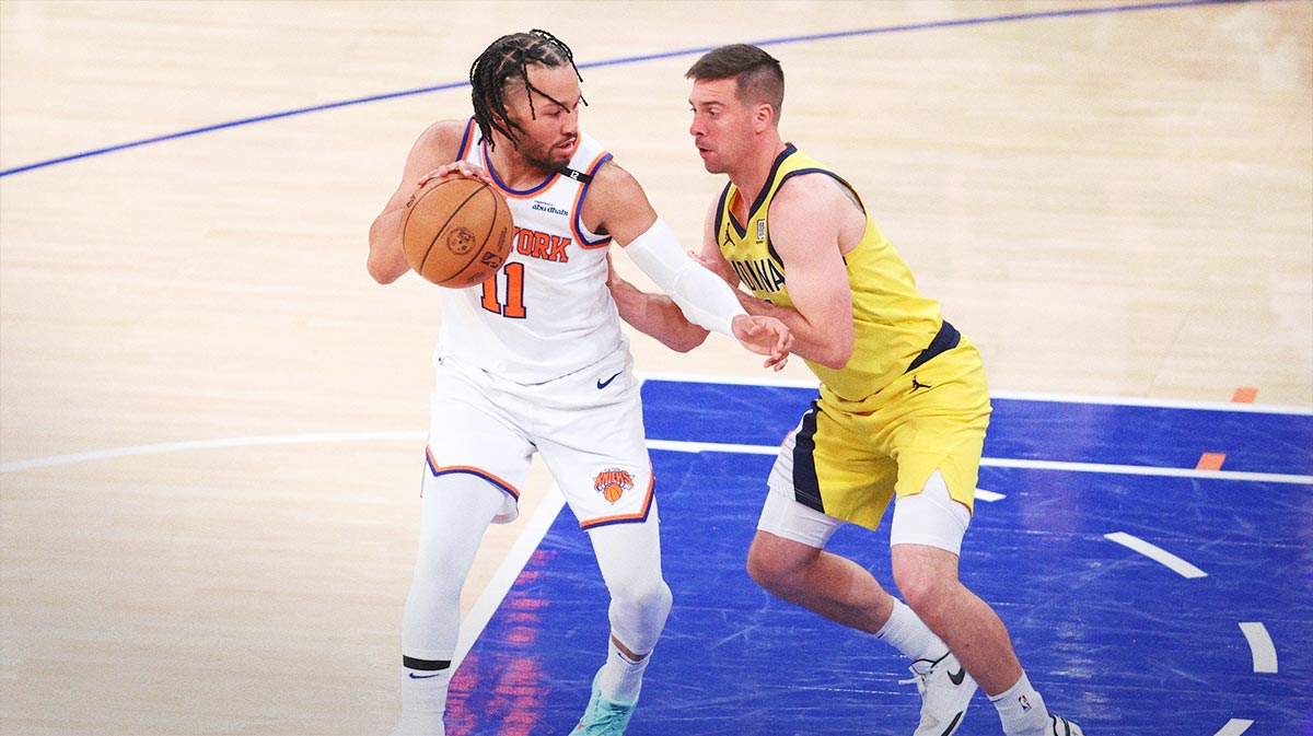 New York Knicks guard Jalen Brunson (11) controls the ball against Indiana Pacers guard T.J. McConnell (9) in the third quarter during game two of the eastern conference finals for the 2025 NBA Playoffs at Madison Square Garden.