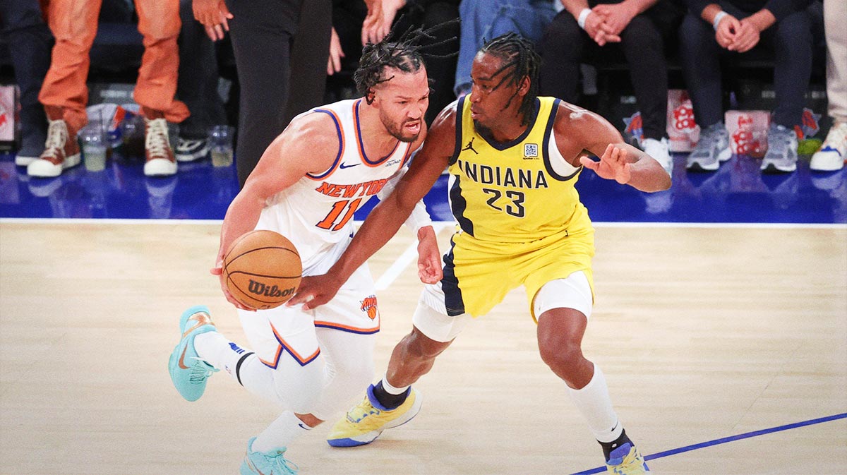 New York Knicks guard Jalen Brunson (11) controls the ball against Indiana Pacers forward Aaron Nesmith (23) in the fourth quarter during game two of the eastern conference finals for the 2025 NBA Playoffs at Madison Square Garden.