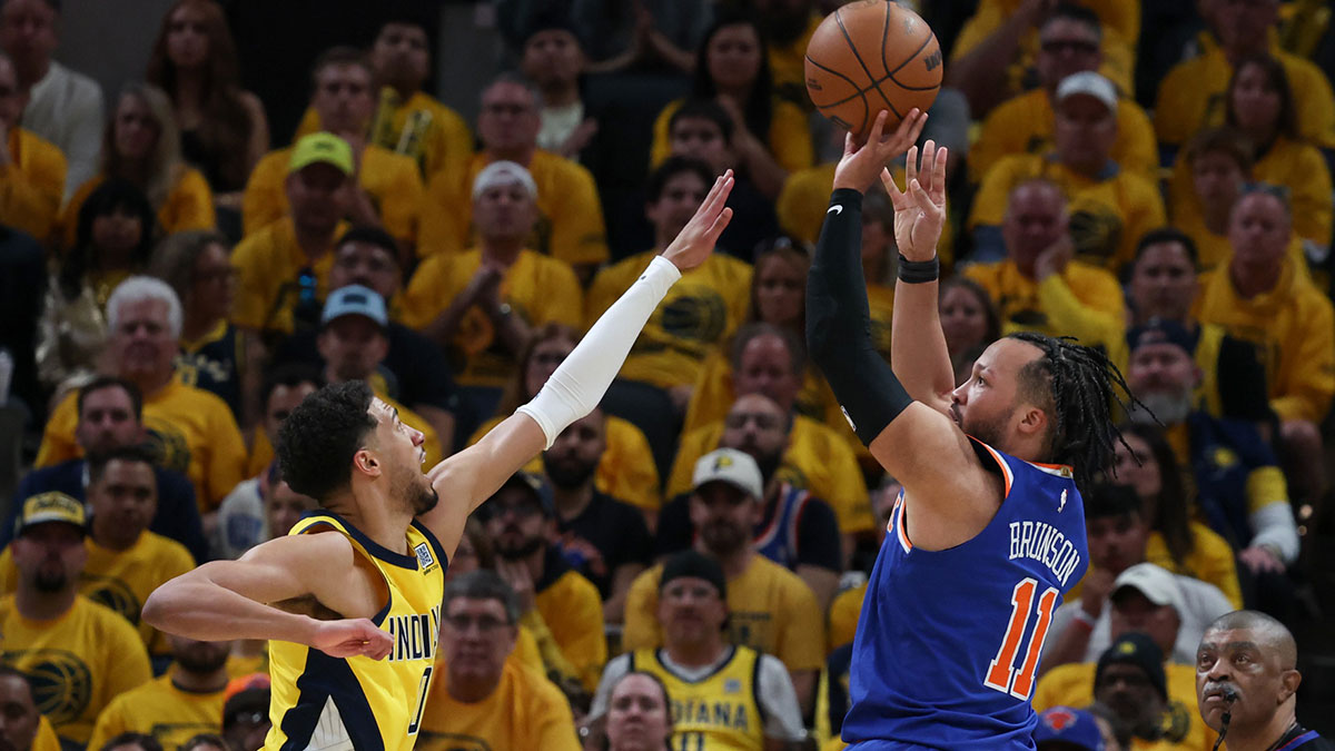New York Knicks guard Jalen Brunson (11) shoots the ball against Indiana Pacers forward Obi Toppin (1) in the second quarter during game six of the eastern conference finals for the 2025 NBA Playoffs at Gainbridge Fieldhouse. Mandatory Credit: Trevor Ruszkowski-Imagn Images