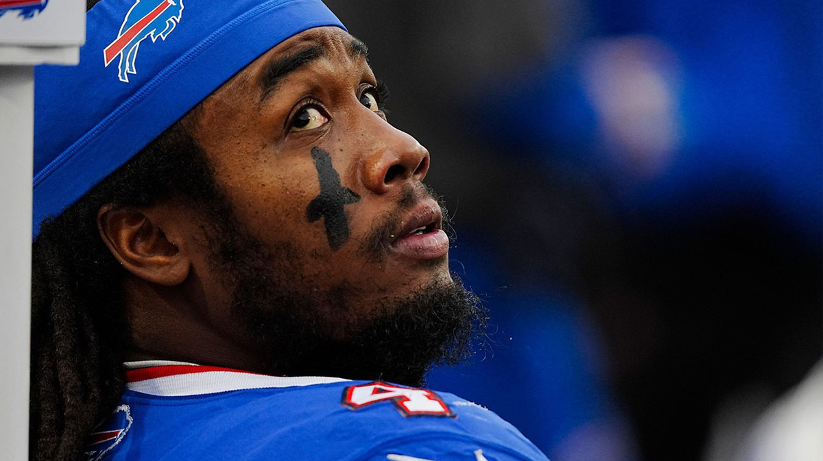 Buffalo Bills running back James Cook (4) takes a breather while the defensive line is on the field during second half of the Bills home game against the New York Jets at Highmark Stadium.