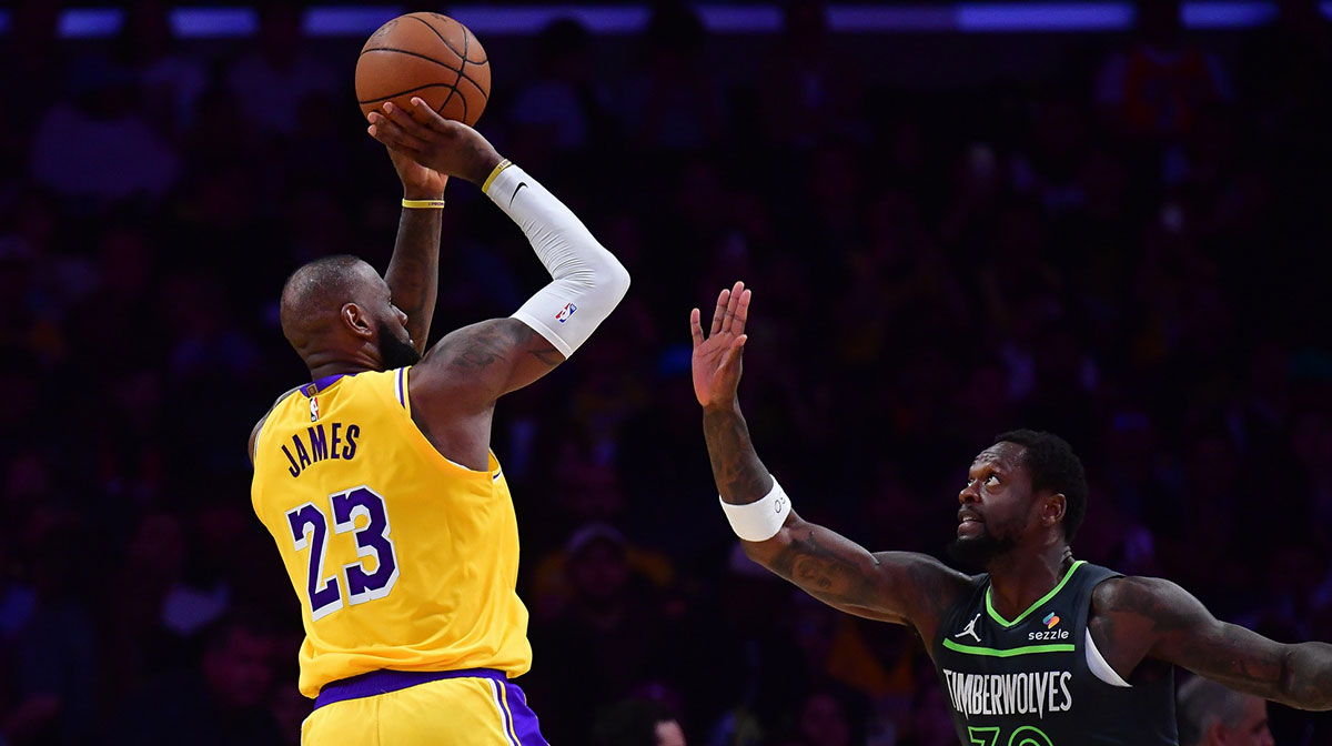 Los Angeles Lakers forward LeBron James (23) shoots against Minnesota Timberwolves forward Julius Randle (30) during the second half in game five of first round for the 2025 NBA Playoffs at Crypto.com Arena.