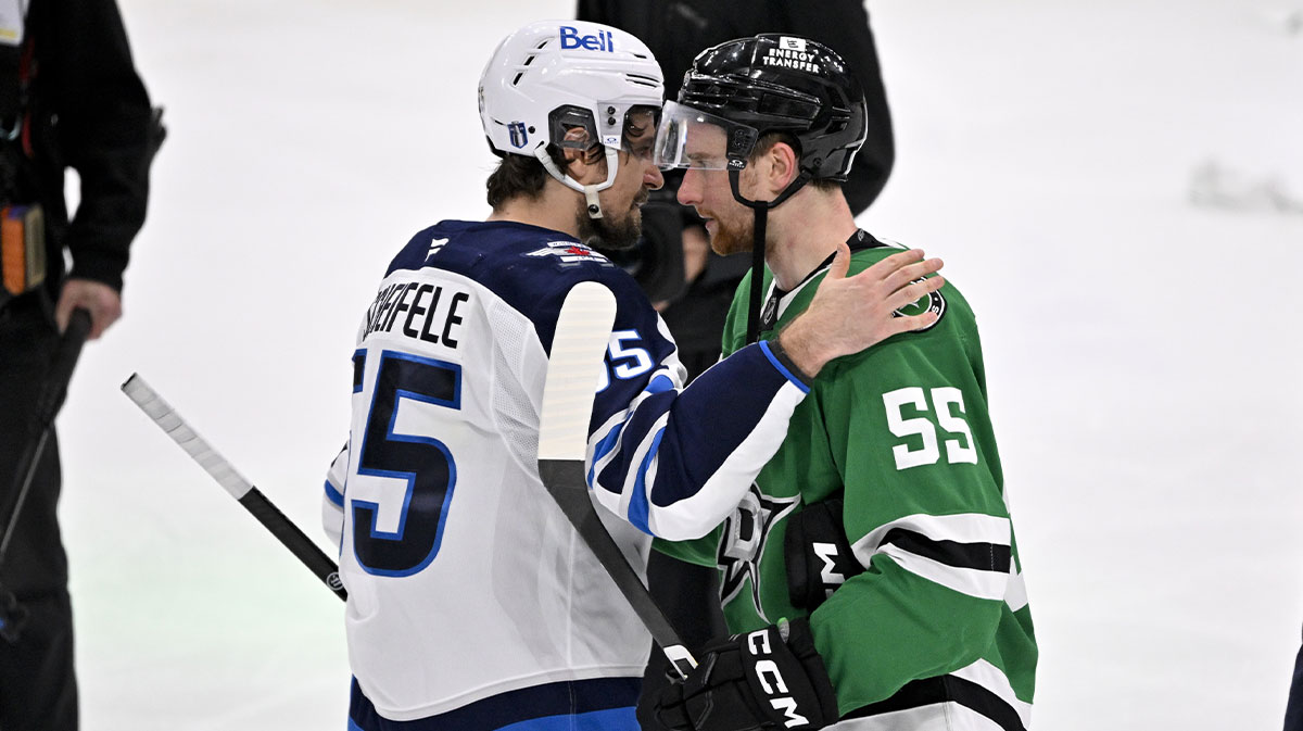 Winnipeg Jets center Mark Scheifele (55) shakes hands with Dallas Stars defenseman Thomas Harley (55) after the Stars defeat the Jets in the overtime period in game six of the second round of the 2025 Stanley Cup Playoffs at American Airlines Center.