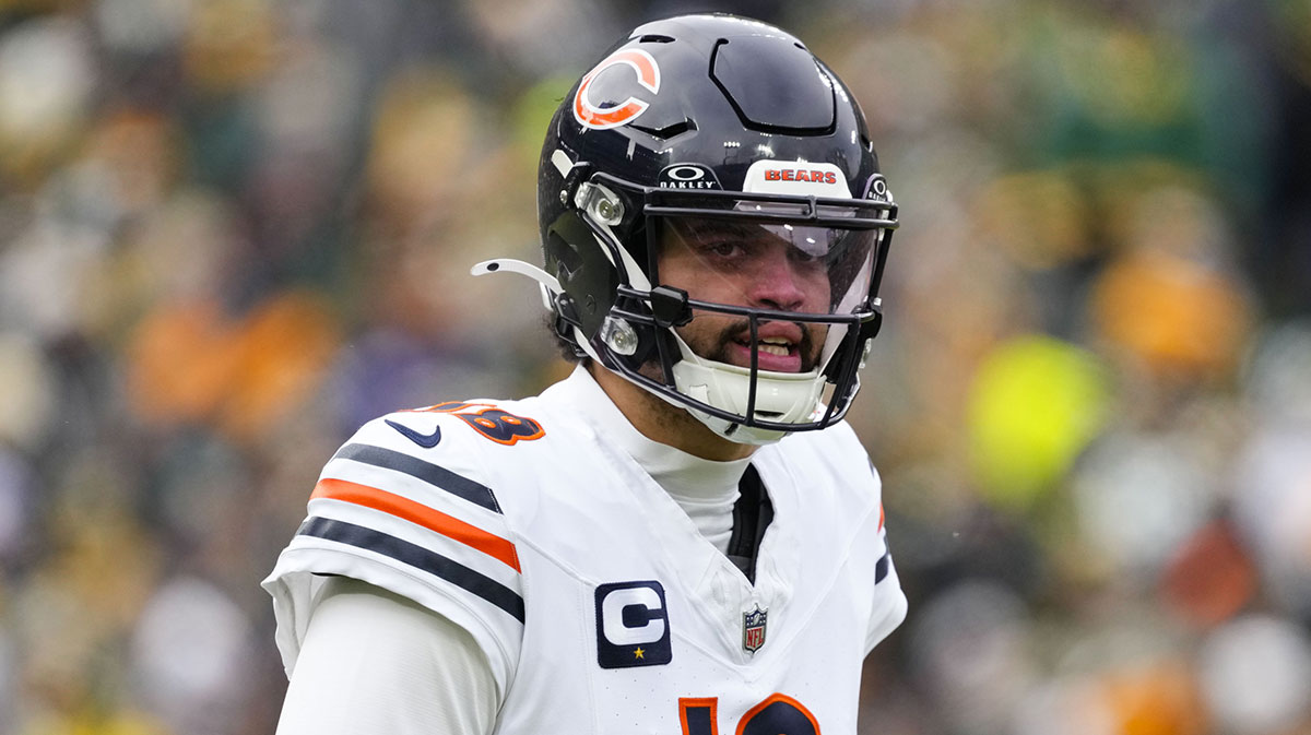 Jan 5, 2025; Green Bay, Wisconsin, USA; Chicago Bears quarterback Caleb Williams (18) during the game against the Chicago Bears at Lambeau Field. Mandatory Credit: Jeff Hanisch-Imagn Images