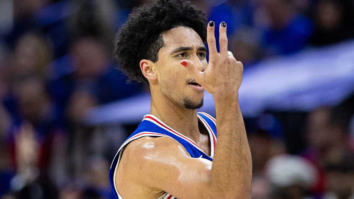Philadelphia 76ers guard Jared McCain (20) reacts to his three pointer against the Orlando Magic during the second quarter at Wells Fargo Center.