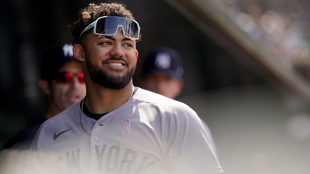May 11, 2025; West Sacramento, California, USA; New York Yankees left fielder Jasson Dominguez (24) stands in the dugout against the Athletics in the seventh inning at Sutter Health Park. Mandatory Credit: Cary Edmondson-Imagn Images