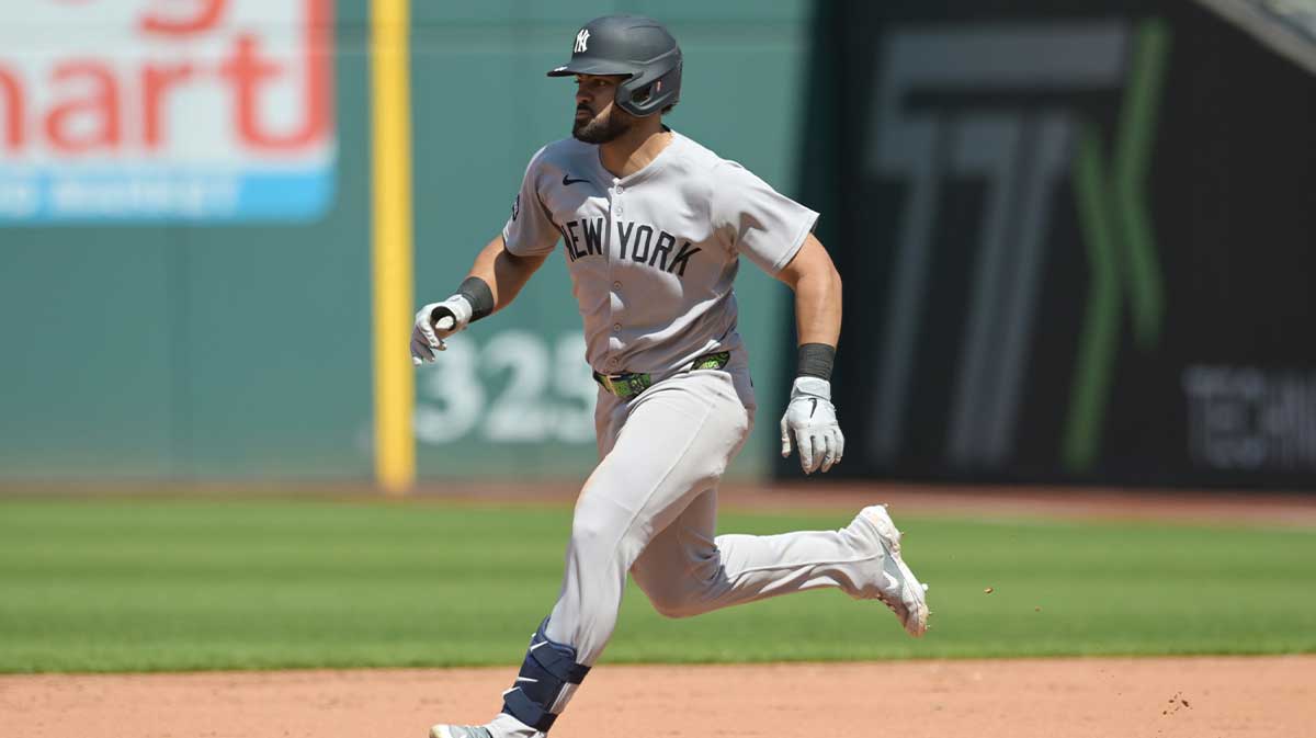 New York Yankees left fielder Jasson Dominguez (24) rounds the bases en route to a double during the fifth inning against the Cleveland Guardians.