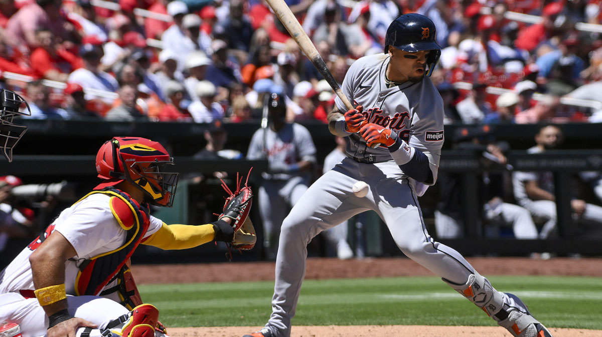 Detroit Tigers center fielder Javier Baez (28) is hit by a pitch by St. Louis Cardinals relief pitcher Phil Maton (not pictured) during the seventh inning at Busch Stadium.