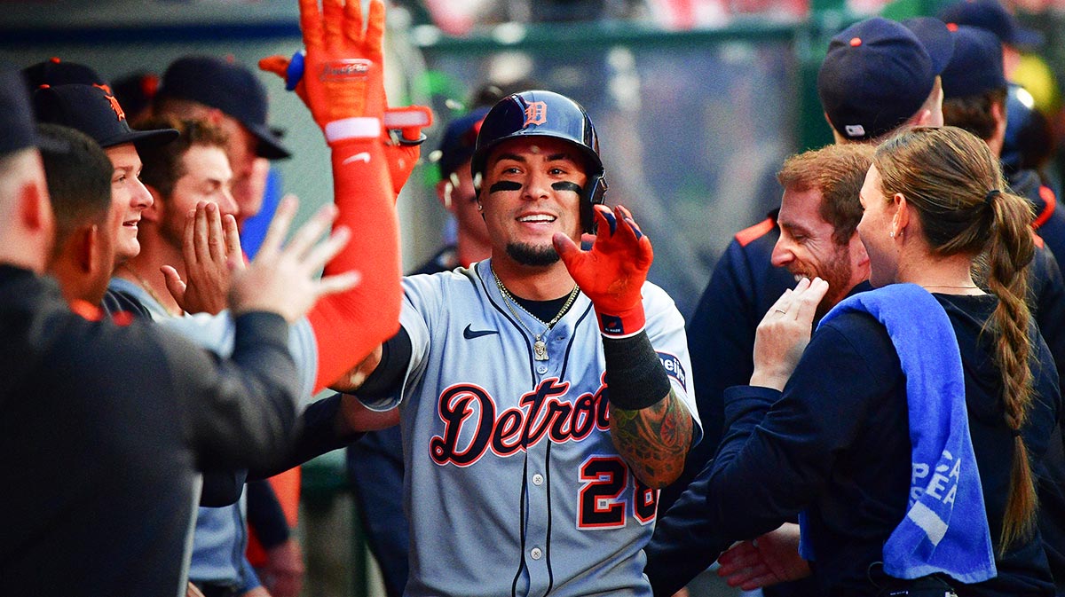 Detroit Tigers center fielder Javier Baez (28) is greeted after hitting a solo home run against the Los Angeles Angels during the third inning at Angel Stadium.