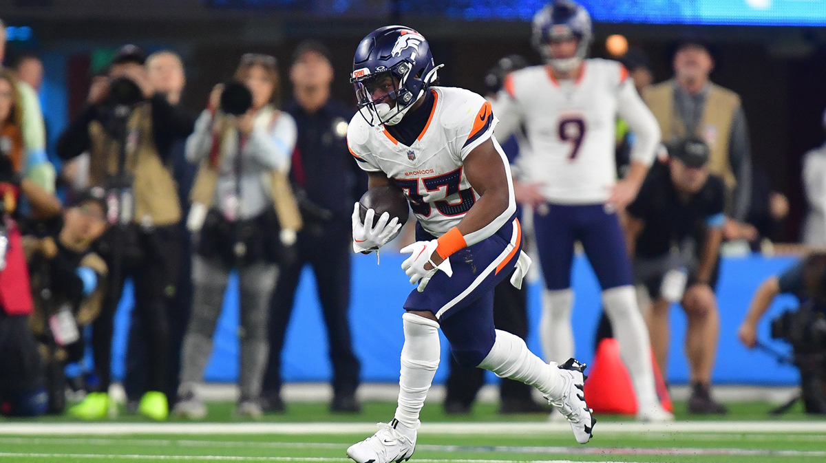 Denver Broncos running back Javonte Williams (33) runs the ball against the Los Angeles Chargers during the first half at SoFi Stadium.