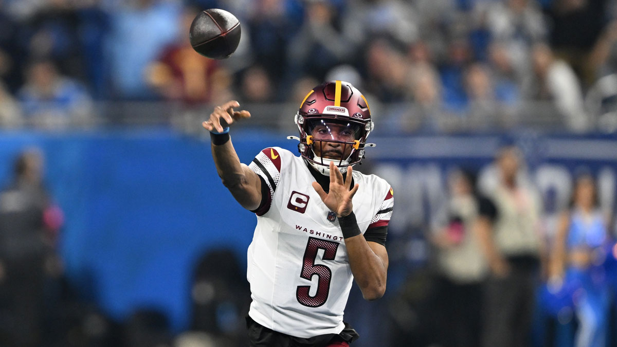 Washington Commanders quarterback Jayden Daniels (5) throws a pass during the first quarter against Detroit Lions in a 2025 NFC divisional round game at Ford Field